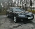 Черный Хендай Соната, объемом двигателя 2.4 л и пробегом 290 тыс. км за 5800 $, фото 3 на Automoto.ua