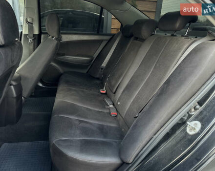 Черный Хендай Соната, объемом двигателя 2 л и пробегом 270 тыс. км за 5400 $, фото 43 на Automoto.ua