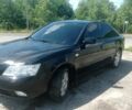 Черный Хендай Соната, объемом двигателя 2 л и пробегом 200 тыс. км за 3700 $, фото 1 на Automoto.ua