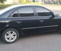 Чорний Хендай Соната, об'ємом двигуна 2.4 л та пробігом 235 тис. км за 6000 $, фото 4 на Automoto.ua