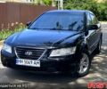 Черный Хендай Соната, объемом двигателя 2 л и пробегом 210 тыс. км за 5100 $, фото 1 на Automoto.ua