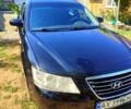 Черный Хендай Соната, объемом двигателя 2 л и пробегом 247 тыс. км за 5700 $, фото 1 на Automoto.ua