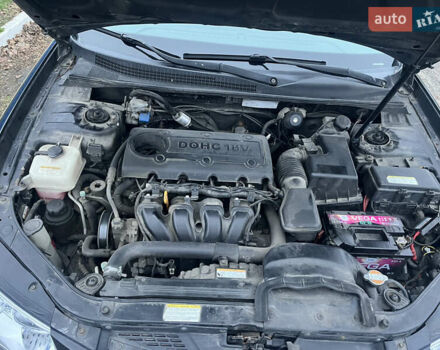 Чорний Хендай Соната, об'ємом двигуна 2.36 л та пробігом 220 тис. км за 3950 $, фото 10 на Automoto.ua