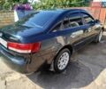 Черный Хендай Соната, объемом двигателя 2 л и пробегом 275 тыс. км за 5000 $, фото 5 на Automoto.ua
