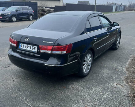 Чорний Хендай Соната, об'ємом двигуна 2.36 л та пробігом 220 тис. км за 3950 $, фото 4 на Automoto.ua