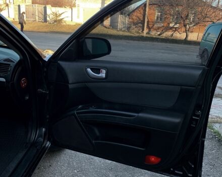 Черный Хендай Соната, объемом двигателя 2 л и пробегом 320 тыс. км за 5299 $, фото 10 на Automoto.ua