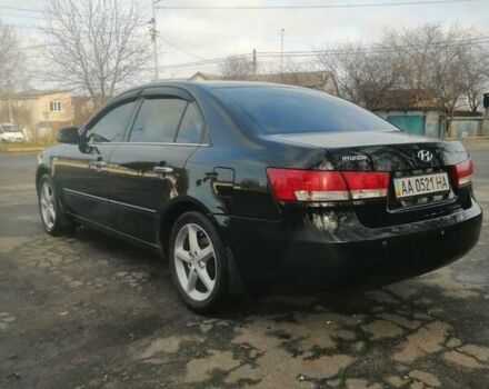 Черный Хендай Соната, объемом двигателя 2.4 л и пробегом 290 тыс. км за 5800 $, фото 2 на Automoto.ua