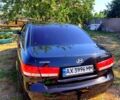 Черный Хендай Соната, объемом двигателя 2 л и пробегом 247 тыс. км за 5700 $, фото 4 на Automoto.ua