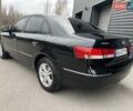 Черный Хендай Соната, объемом двигателя 2 л и пробегом 110 тыс. км за 9700 $, фото 10 на Automoto.ua