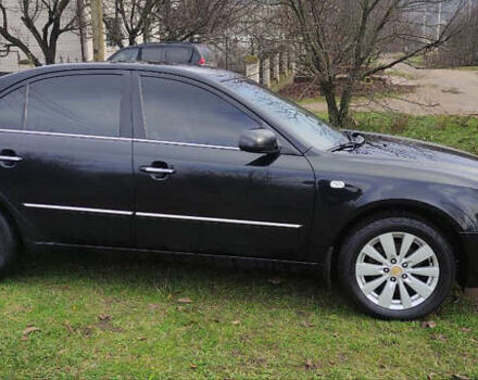 Черный Хендай Соната, объемом двигателя 2.4 л и пробегом 275 тыс. км за 6000 $, фото 7 на Automoto.ua