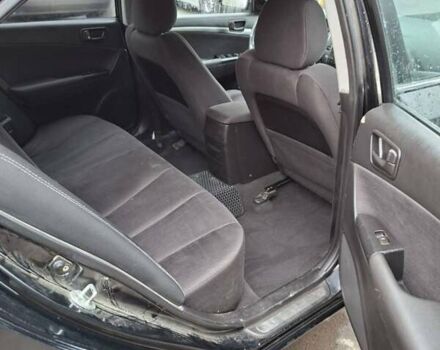 Черный Хендай Соната, объемом двигателя 2 л и пробегом 264 тыс. км за 5400 $, фото 10 на Automoto.ua
