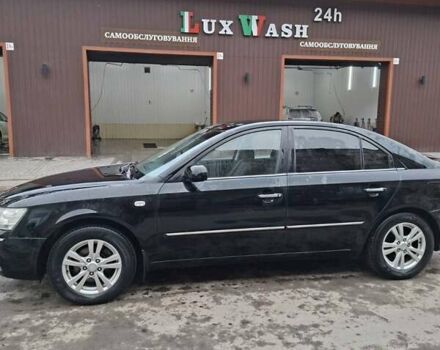 Черный Хендай Соната, объемом двигателя 2 л и пробегом 264 тыс. км за 5400 $, фото 2 на Automoto.ua