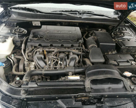 Черный Хендай Соната, объемом двигателя 2 л и пробегом 90 тыс. км за 9800 $, фото 19 на Automoto.ua