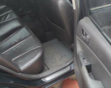 Черный Хендай Соната, объемом двигателя 2.4 л и пробегом 275 тыс. км за 6000 $, фото 14 на Automoto.ua