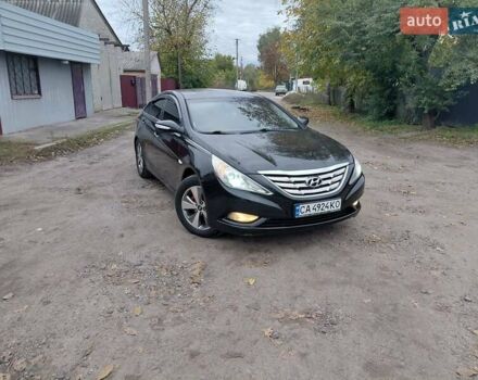 Черный Хендай Соната, объемом двигателя 2 л и пробегом 200 тыс. км за 7000 $, фото 1 на Automoto.ua