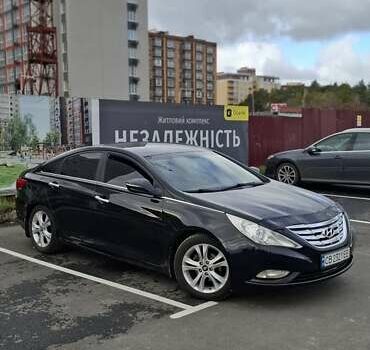Чорний Хендай Соната, об'ємом двигуна 2.4 л та пробігом 208 тис. км за 8600 $, фото 4 на Automoto.ua