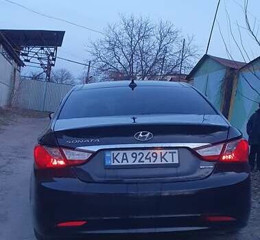 Чорний Хендай Соната, об'ємом двигуна 2.36 л та пробігом 165 тис. км за 9900 $, фото 1 на Automoto.ua