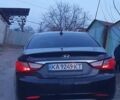 Чорний Хендай Соната, об'ємом двигуна 2.36 л та пробігом 165 тис. км за 9900 $, фото 1 на Automoto.ua