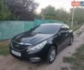 Черный Хендай Соната, объемом двигателя 2 л и пробегом 176 тыс. км за 8700 $, фото 1 на Automoto.ua