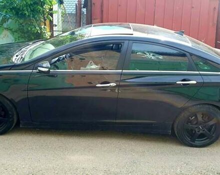 Чорний Хендай Соната, об'ємом двигуна 2.36 л та пробігом 165 тис. км за 9900 $, фото 2 на Automoto.ua