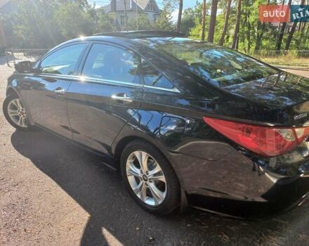 Черный Хендай Соната, объемом двигателя 2.36 л и пробегом 118 тыс. км за 9600 $, фото 114 на Automoto.ua