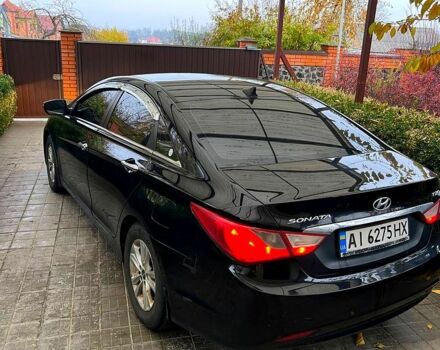 Чорний Хендай Соната, об'ємом двигуна 2 л та пробігом 215 тис. км за 9199 $, фото 1 на Automoto.ua