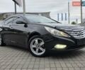 Чорний Хендай Соната, об'ємом двигуна 2.4 л та пробігом 193 тис. км за 7999 $, фото 1 на Automoto.ua
