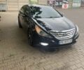 Черный Хендай Соната, объемом двигателя 2 л и пробегом 200 тыс. км за 9000 $, фото 1 на Automoto.ua