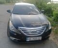 Черный Хендай Соната, объемом двигателя 2 л и пробегом 210 тыс. км за 12500 $, фото 1 на Automoto.ua