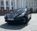 Черный Хендай Соната, объемом двигателя 2.4 л и пробегом 200 тыс. км за 8000 $, фото 1 на Automoto.ua