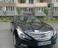 Черный Хендай Соната, объемом двигателя 2.4 л и пробегом 180 тыс. км за 7900 $, фото 1 на Automoto.ua