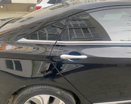 Чорний Хендай Соната, об'ємом двигуна 2.4 л та пробігом 208 тис. км за 11700 $, фото 1 на Automoto.ua