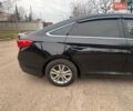 Чорний Хендай Соната, об'ємом двигуна 2.36 л та пробігом 203 тис. км за 8000 $, фото 2 на Automoto.ua