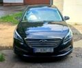 Черный Хендай Соната, объемом двигателя 2.4 л и пробегом 166 тыс. км за 10700 $, фото 1 на Automoto.ua