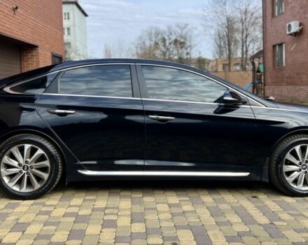 Черный Хендай Соната, объемом двигателя 2.4 л и пробегом 150 тыс. км за 12000 $, фото 1 на Automoto.ua