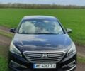Чорний Хендай Соната, об'ємом двигуна 2.4 л та пробігом 140 тис. км за 11100 $, фото 1 на Automoto.ua