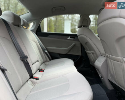 Хендай Соната 2014 у Ковель на Automoto.ua Чорний Хендай Соната, об'ємом двигуна 2.36 л та пробігом 215 тис. км за 10500 $, фото 53 на Automoto.ua