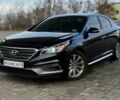 Чорний Хендай Соната, об'ємом двигуна 2.4 л та пробігом 145 тис. км за 9599 $, фото 1 на Automoto.ua