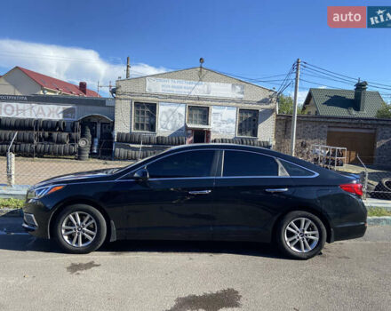 Черный Хендай Соната, объемом двигателя 2.36 л и пробегом 171 тыс. км за 9500 $, фото 1 на Automoto.ua