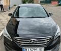 Чорний Хендай Соната, об'ємом двигуна 2.36 л та пробігом 237 тис. км за 12300 $, фото 1 на Automoto.ua