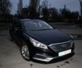 Черный Хендай Соната, объемом двигателя 2.36 л и пробегом 107 тыс. км за 11500 $, фото 1 на Automoto.ua