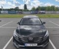Чорний Хендай Соната, об'ємом двигуна 2.36 л та пробігом 174 тис. км за 11800 $, фото 1 на Automoto.ua