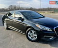 Чорний Хендай Соната, об'ємом двигуна 2 л та пробігом 74 тис. км за 12800 $, фото 1 на Automoto.ua