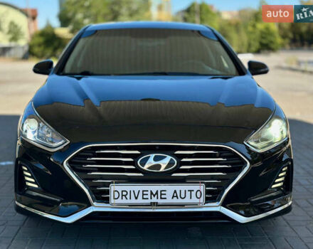 Чорний Хендай Соната, об'ємом двигуна 2.4 л та пробігом 173 тис. км за 11899 $, фото 1 на Automoto.ua