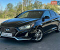 Чорний Хендай Соната, об'ємом двигуна 2.4 л та пробігом 173 тис. км за 11899 $, фото 1 на Automoto.ua