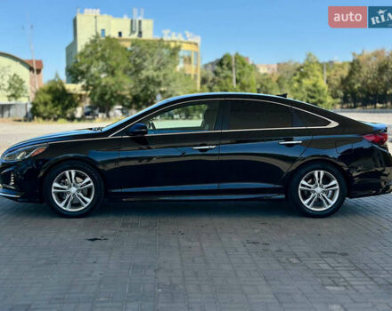 Чорний Хендай Соната, об'ємом двигуна 2.4 л та пробігом 173 тис. км за 11899 $, фото 3 на Automoto.ua