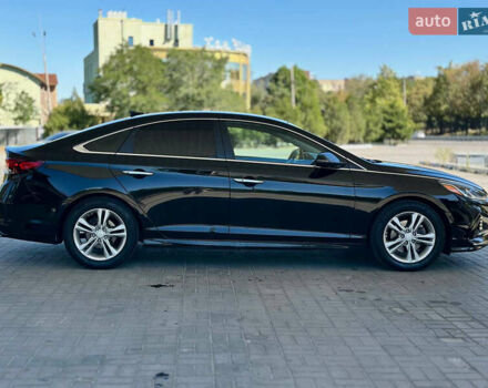 Чорний Хендай Соната, об'ємом двигуна 2.4 л та пробігом 173 тис. км за 11899 $, фото 7 на Automoto.ua