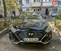 Чорний Хендай Соната, об'ємом двигуна 2.4 л та пробігом 77 тис. км за 13600 $, фото 1 на Automoto.ua