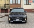 Черный Хендай Соната, объемом двигателя 2.4 л и пробегом 146 тыс. км за 11950 $, фото 1 на Automoto.ua