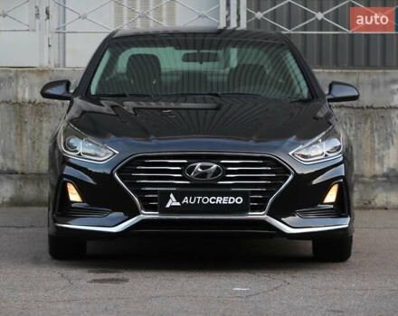 Чорний Хендай Соната, об'ємом двигуна 2.36 л та пробігом 77 тис. км за 13900 $, фото 1 на Automoto.ua